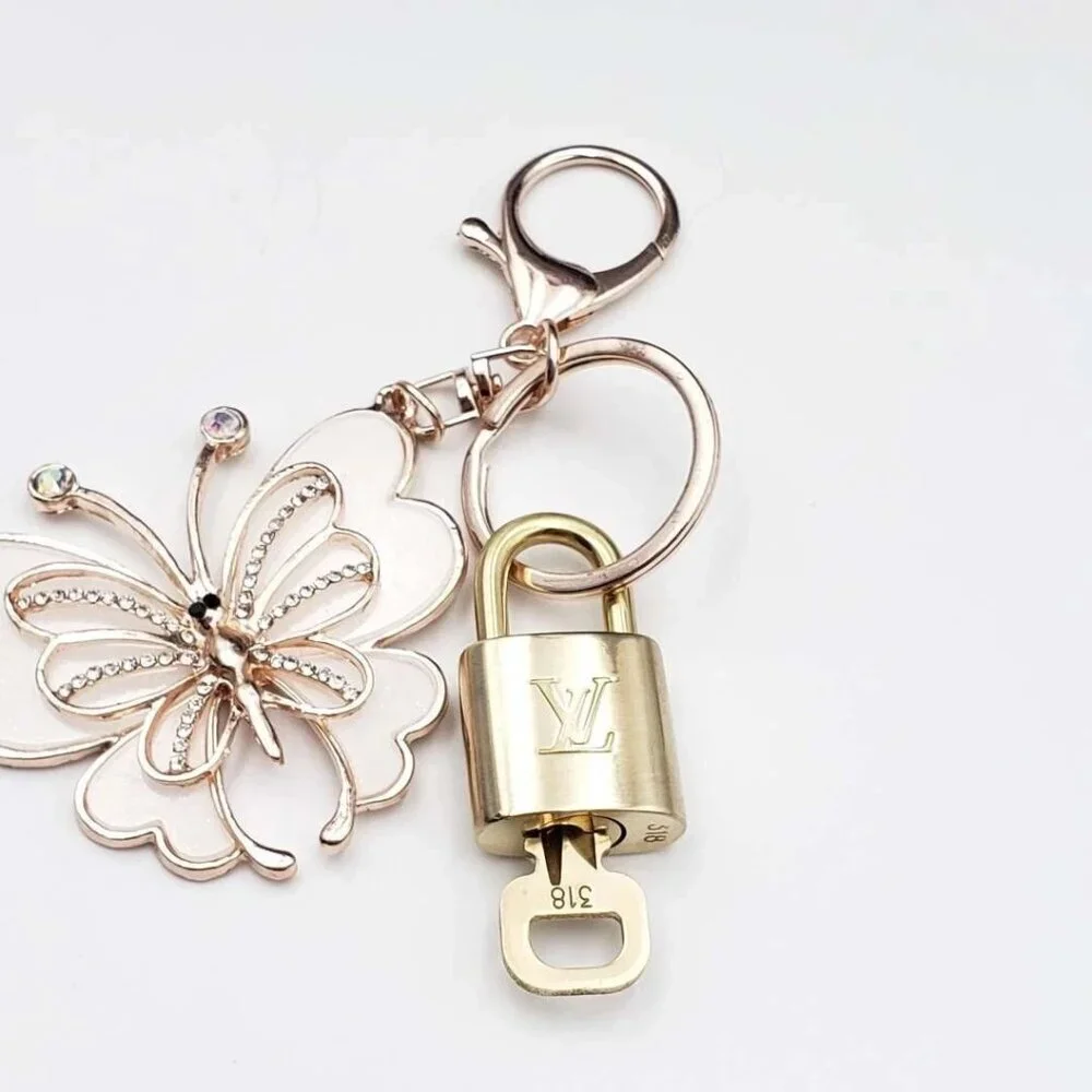 Authentic Louis Vuitton Lock & Key with unbranded Butterfly Bagcharm, Keycharm